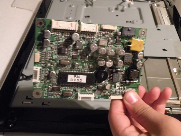 Image 2/2: This connector isn't used, it is left disconnected, I am assuming that it is to test the display for Apple.