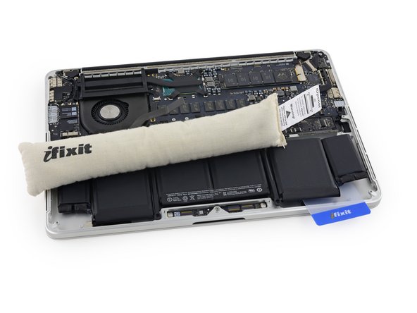 Image 3/3: Again, leave it in each position for about a minute, reheating in between, to heat each half of the left-most battery cells.