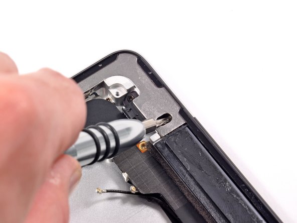 Image 3/3: Pesky, finicky screws! Be gone and let us remove the antenna in peace.