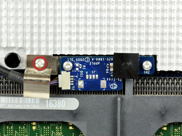 Image 1/2: The IR board and cable finger are now free from the logic board and may fall.