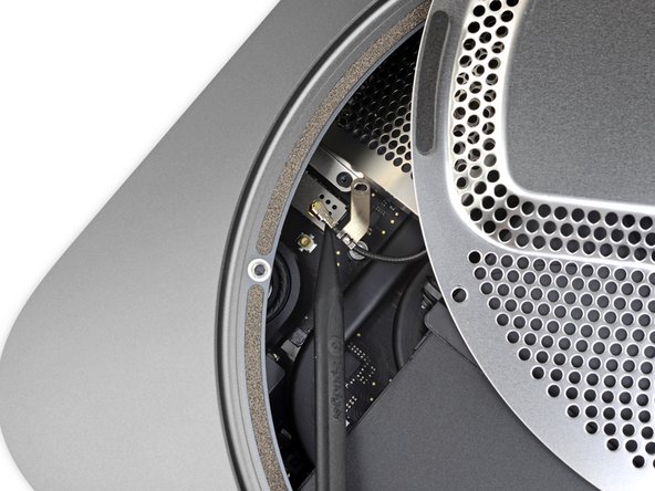 Use the point of a spudger or fine tweezers to gently pry the antenna cable connector straight up off its socket on the logic board.