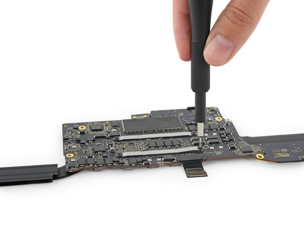 Image 2/3: ...We're a little disappointed that ''advanced architecture'' really meant "relocation of the heat sink screws to the backside of the logic board."