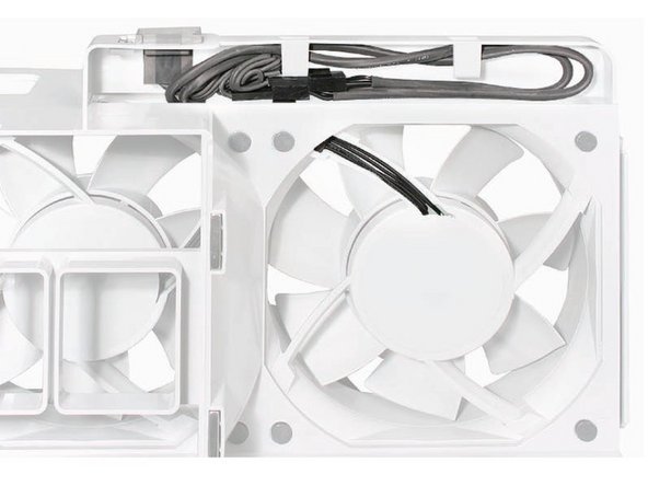 Image 2/2: Replacement Note: Before re-installing the front fan assembly in the enclosure, make sure that the fan cables are routed correctly in the fan channel. This can also be slightly tricky so pay attention to the alignment of the connectors on the fan unit and logic board.