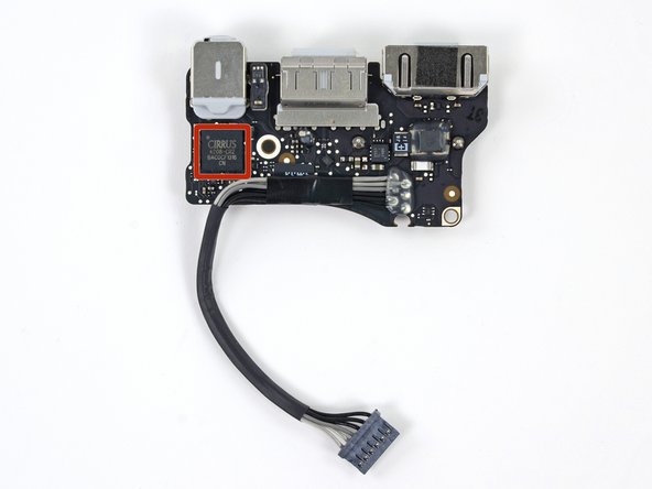 Image 3/3: We find a Cirrus chip marked 4208-CRZ next to the headphone jack. This appears to be a two-channel version of the CS4207 low power HD audio codec with headphone amp.