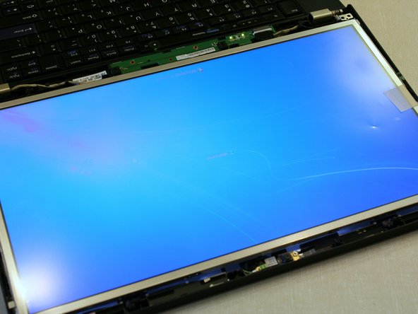 Image 1/3: If everything looks ok then remove the battery and put the screws in. Remove the protective sheet from the display and put the bezel back on.
