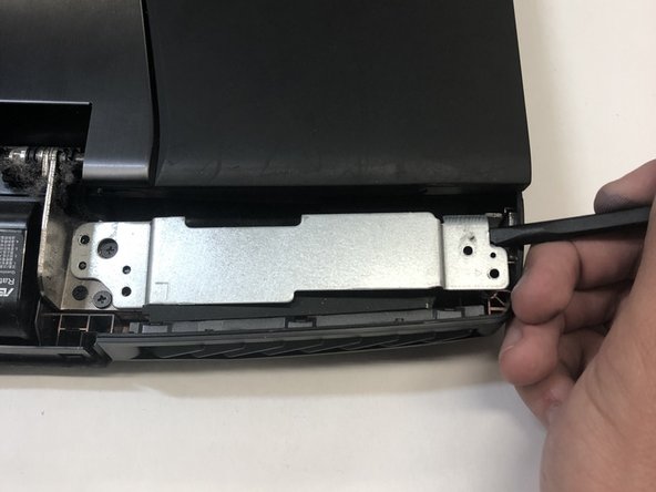 بلند کردن محفظه فلزی هر سمت لپ تاپ