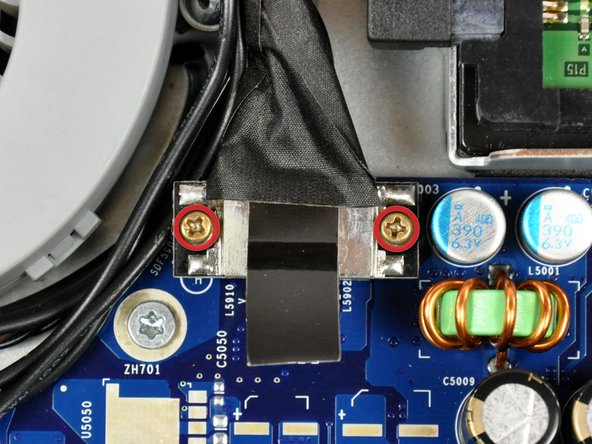 Image 1/2: Using its black pull tab, pull the display data cable connector straight up off its socket on the logic board.