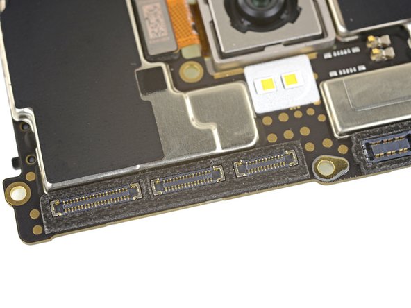 Before we leave the board, let's talk waterproofing. We found some! There are black silicone seals surrounding all these flex cable sockets—as we found previously on the OnePlus 5, and just like on every iPhone since the 6s.