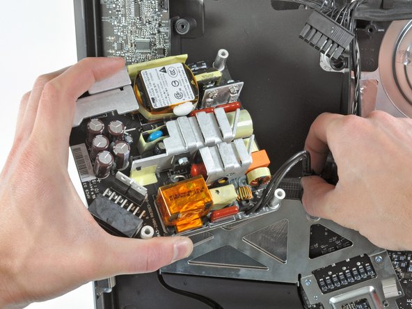 Image 2/3: The WD Caviar Blue drive is a non-standard SATA drive. The power connector features 7 pins, rather than the standard 4. The drive also has non-standard firmware. This means you can only use Apple's own hard drives and not any standard after-market SATA drive.