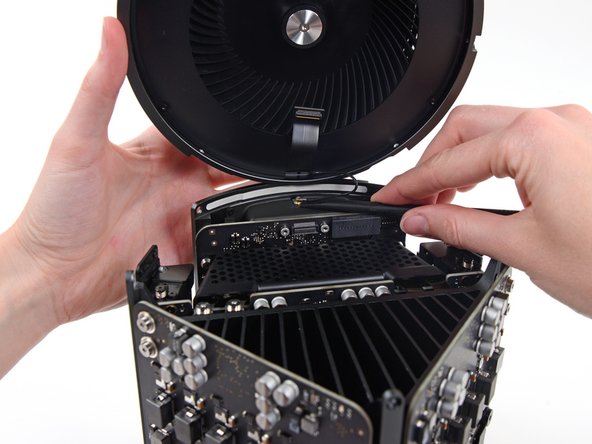 Image 1/1: Remove the fan assembly from the Mac Pro.
