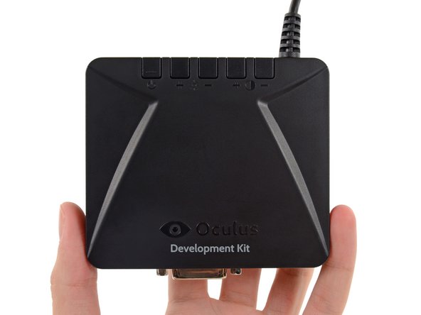 Image 1/2: Our Development Kit control box is a pretty basic device, consisting of buttons for adjusting the Rift's settings and a handful of I/O ports.