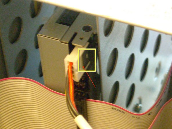 Image 2/3: Pull the drives out of the bay.