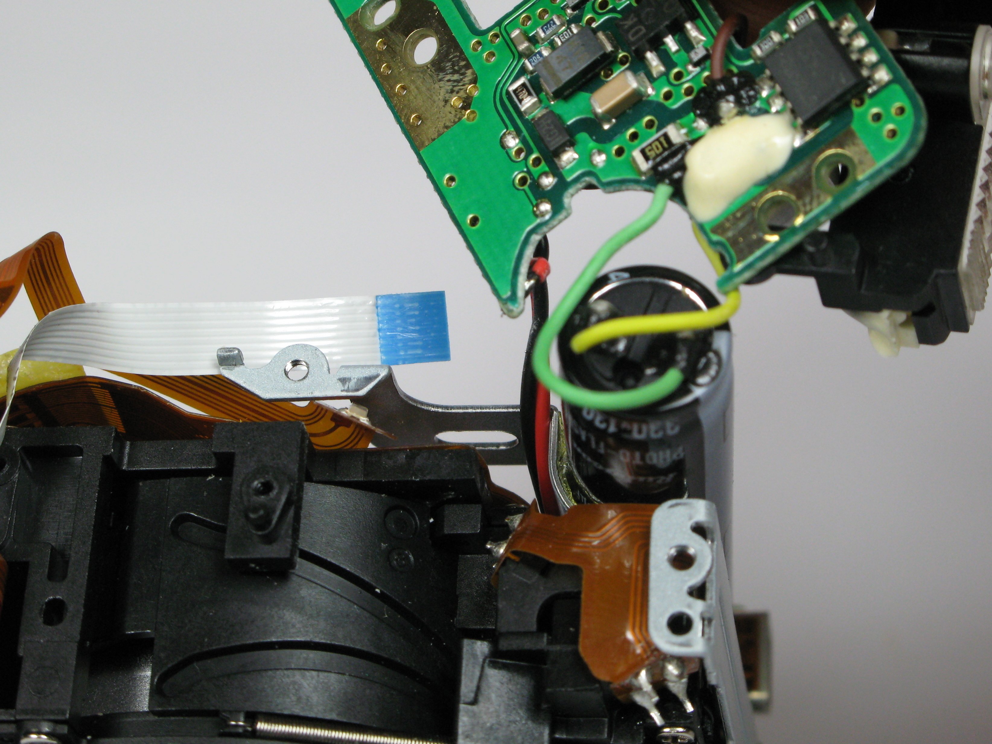 Canon PowerShot A75 Motherboard/Capacitor Replacement iFixit Repair Guide