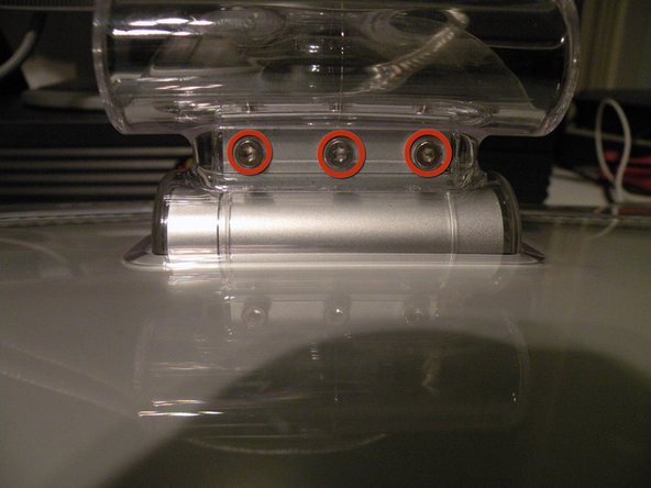 Image 2/3: Then remove the swing arm, and the piece of plastic underneath it.