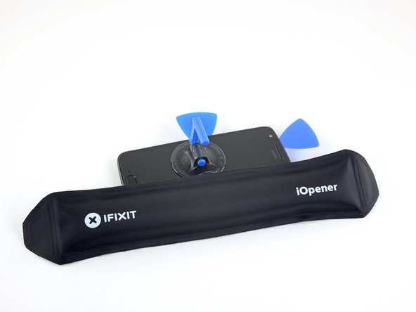 Heat the screen's right edge with an iOpener.