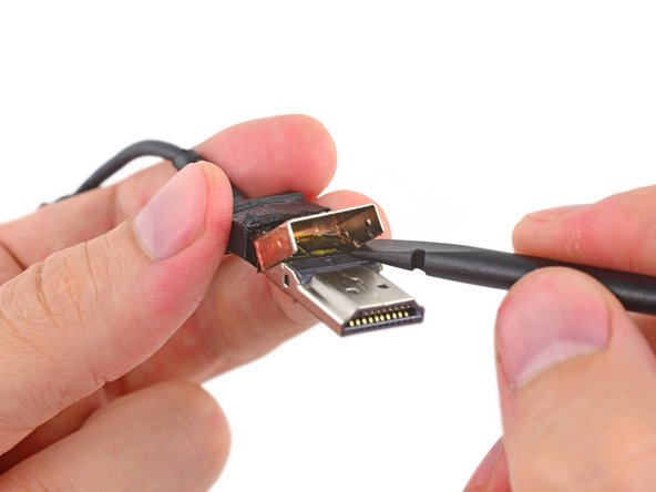 Image 2/3: We find the [http://www.spectra7.com/pdfs/products/VR7100-S-Product-Brief-Rev2.pdf|Spectra7 VR7100|new_window=true] processor buried under what seems to be a thick encasing of glue.