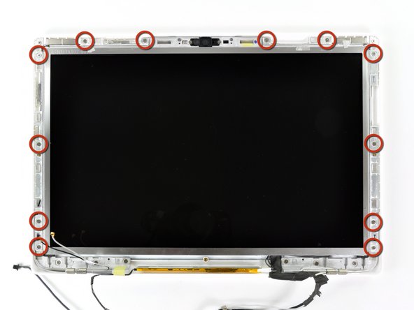 Remove the twelve 4.2 mm Phillips screws securing the LCD assembly to the rear display bezel.