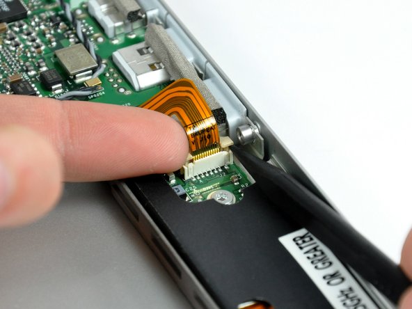 Image 2/2: The ZIF cable lock should raise about 1 mm and stop. '''Do not''' attempt to completely remove the ZIF cable lock.