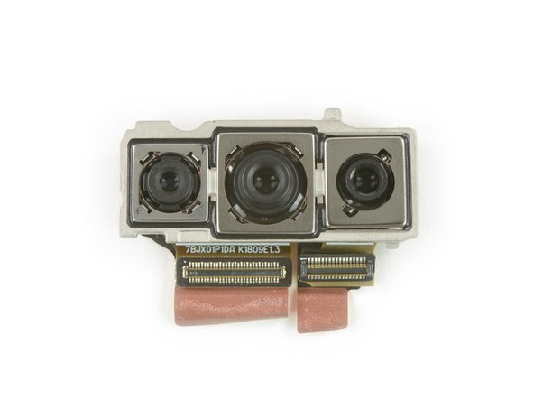 The three rear cameras get by with just two connectorsâthe main camera and the monochrome camera share one port, while the telephoto camera gets the other all to itself.