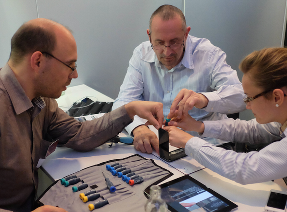 Members of the European Parliament doing their own phone repair